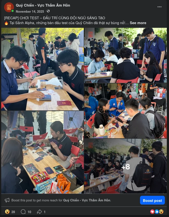 Quỷ Chiến Facebook playtesting recap showing participants and the creative team playing the card game at tables in Sảnh Alpha